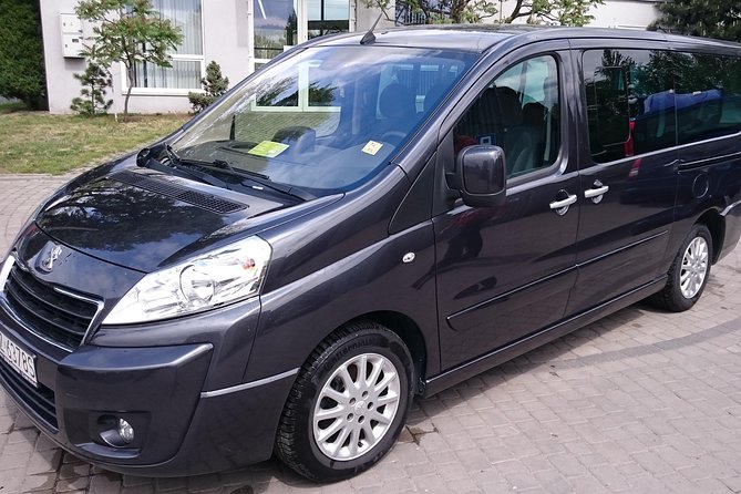 Warsaw Chopin Airport private transfer 5 to 8 passengers - Finding Your Driver at Arrivals EXIT 2 (Sign in Hand)