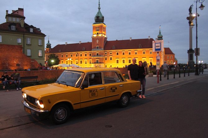 Warsaw Evening Private Tour by Retro Fiat - Rynek Starego Miasta at night: mermaid symbolism and a quick hit of war memory
