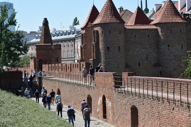 Warsaw Old Town Guided Tour with Antek & Friends | small groups - Ghetto boundary markers, and why the timing is deliberate