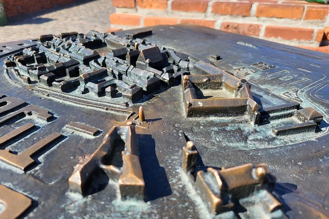 Warsaw Old Town (UNESCO area): Facts & Legends | small groups - Stop 4: Kanonia, the narrowest house and the magic bell