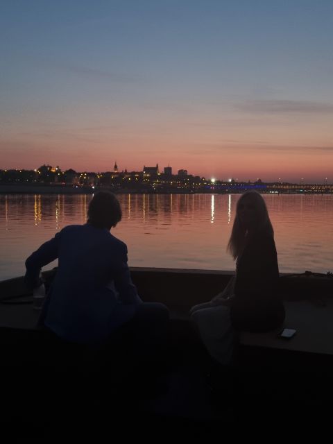 Warsaw: Vistula River Sunset Cruise with Welcome Drink - Old Town and Royal Castle area: the water gives you spacing and perspective